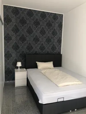 Ein Bett oder Betten in einem Zimmer der Unterkunft Hotel Restaurant Artemis