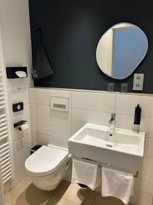 Ein Badezimmer in der Unterkunft DK Hotel Heidelberg