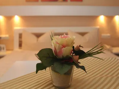 Ein Bett oder Betten in einem Zimmer der Unterkunft Hotel Irene