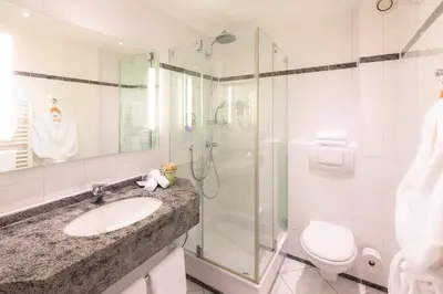 Ein Badezimmer in der Unterkunft Hotel Scheffelhöhe