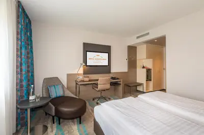 Ein Bett oder Betten in einem Zimmer der Unterkunft Hotel Scheffelhöhe