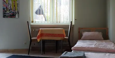 Ein Bett oder Betten in einem Zimmer der Unterkunft Kleines Studio 07, für den kurzen Aufenthalt