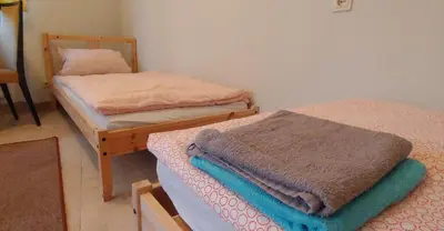 Ein Bett oder Betten in einem Zimmer der Unterkunft Kleines Studio 07, für den kurzen Aufenthalt