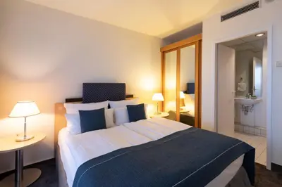 Ein Bett oder Betten in einem Zimmer der Unterkunft Garner Hotel Rüsselsheim by IHG
