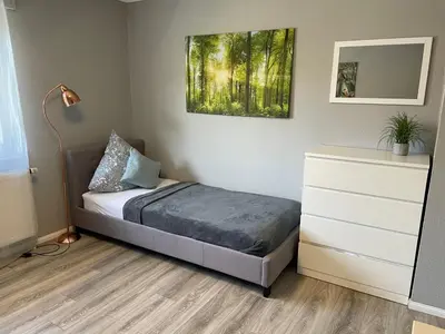 Ein Bett oder Betten in einem Zimmer der Unterkunft Work & Study Apartment