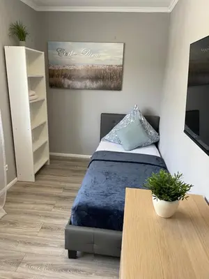 Ein Bett oder Betten in einem Zimmer der Unterkunft Work & Study Apartment