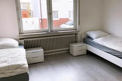 Ein Bett oder Betten in einem Zimmer der Unterkunft 3 Zimmer Apartment mit Küche, TV & WLAN