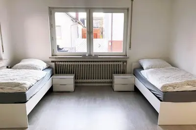 Ein Bett oder Betten in einem Zimmer der Unterkunft 3 Zimmer Apartment mit Küche, TV & WLAN