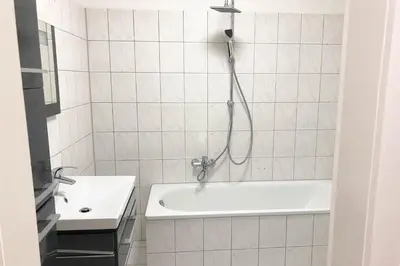 Ein Badezimmer in der Unterkunft 3 Zimmer Apartment mit Küche, TV & WLAN