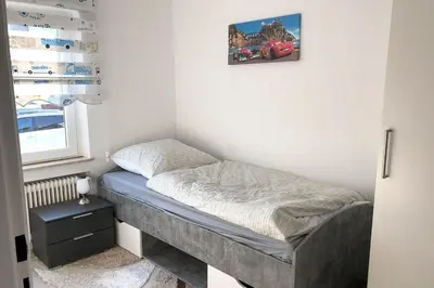 Ein Bett oder Betten in einem Zimmer der Unterkunft 3 Zimmer Apartment mit Küche, TV & WLAN