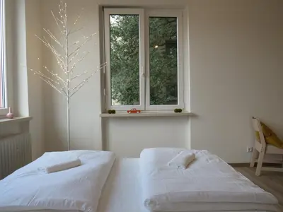 Ein Bett oder Betten in einem Zimmer der Unterkunft L8 Street Monteurwohnung - Kaiser-Friedrich-Str
