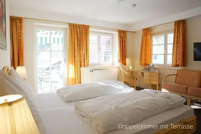 Ein Bett oder Betten in einem Zimmer der Unterkunft Das Lamm Heidelberg
