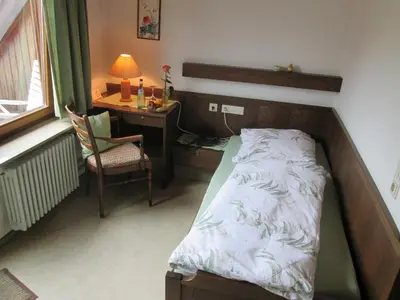 Ein Bett oder Betten in einem Zimmer der Unterkunft Land-gut-Hotel Landgasthof Hotel Ochsen