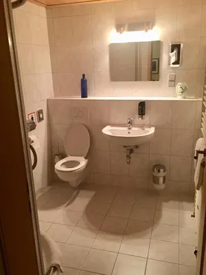 Ein Badezimmer in der Unterkunft Hotel Restaurant Parthenon