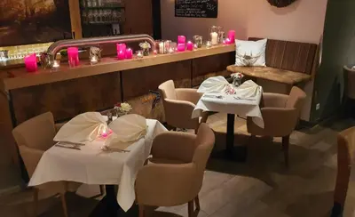 Ein Sitzbereich in der Unterkunft Müller´s Landhotel