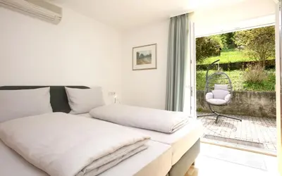 Ein Bett oder Betten in einem Zimmer der Unterkunft Ferienwohnung Waldfrieden