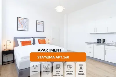 Ein Bett oder Betten in einem Zimmer der Unterkunft STAY@MA Boardinghouse Mannheim