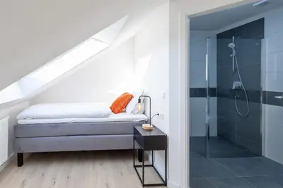 Ein Bett oder Betten in einem Zimmer der Unterkunft STAY@MA Boardinghouse Mannheim