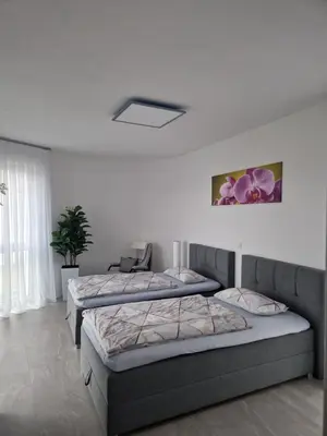Ein Bett oder Betten in einem Zimmer der Unterkunft Ferienwohnung Alona