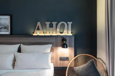 Ein Bett oder Betten in einem Zimmer der Unterkunft HARBR Hotel Ludwigsburg, a member of Radisson Individuals