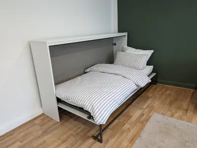 Ein Bett oder Betten in einem Zimmer der Unterkunft Ihre Ferienwohnung in 67454 Haßloch - Pfalz