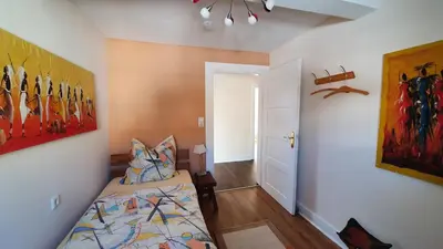 Ein Bett oder Betten in einem Zimmer der Unterkunft Ferienwohnung Sägemühle