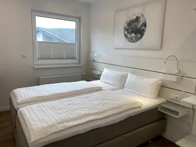 Ein Bett oder Betten in einem Zimmer der Unterkunft Main Motel