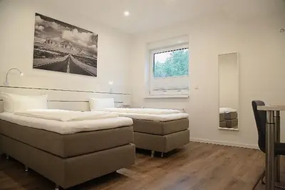 Ein Bett oder Betten in einem Zimmer der Unterkunft Main Motel