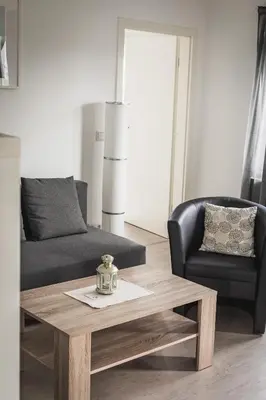 Ein Sitzbereich in der Unterkunft Pension Nickel Ferienwohnung I Waldstraße 18 Alsbach-Hähnlein