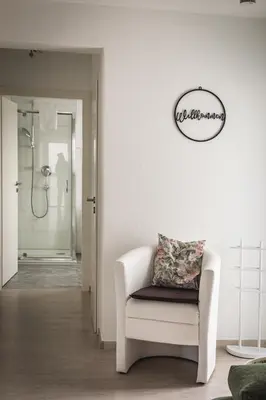Ein Sitzbereich in der Unterkunft Pension Nickel Ferienwohnung I Waldstraße 18 Alsbach-Hähnlein