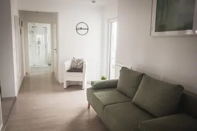 Ein Sitzbereich in der Unterkunft Pension Nickel Ferienwohnung I Waldstraße 18 Alsbach-Hähnlein