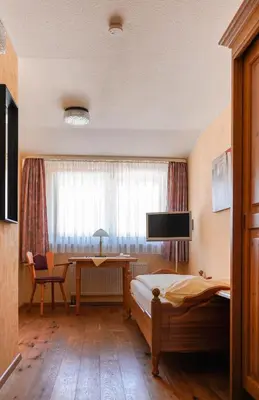 Ein Bett oder Betten in einem Zimmer der Unterkunft Frühstückspension Christinenhof