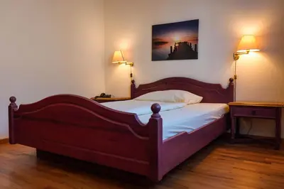 Ein Bett oder Betten in einem Zimmer der Unterkunft Frühstückspension Christinenhof
