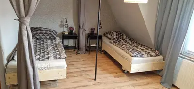 Ein Bett oder Betten in einem Zimmer der Unterkunft Pralinchen-Die Ferienwohnung im Nord-Schwarzwald