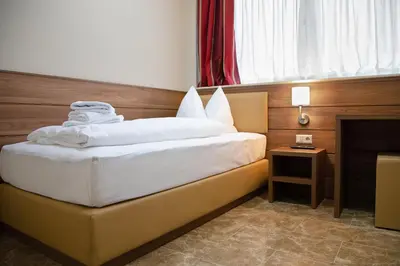Ein Bett oder Betten in einem Zimmer der Unterkunft Work & Sleep Boardinghouse Mannheim