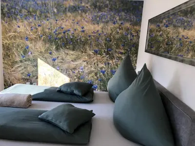 Ein Sitzbereich in der Unterkunft Wohnen beim Brotsommelier - Alpenkruste