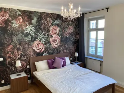 Ein Bett oder Betten in einem Zimmer der Unterkunft Café & Hotel Knösel