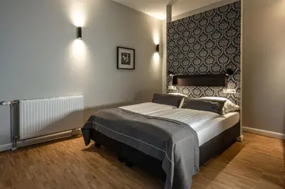 Ein Bett oder Betten in einem Zimmer der Unterkunft Hotel zur Krone