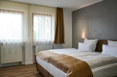 Ein Bett oder Betten in einem Zimmer der Unterkunft Hotel-Restaurant Kölbl