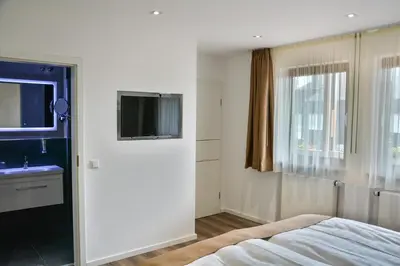 Ein Bett oder Betten in einem Zimmer der Unterkunft Hotel-Restaurant Kölbl