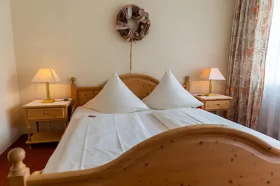 Ein Bett oder Betten in einem Zimmer der Unterkunft Hotel Bad Dürkheim