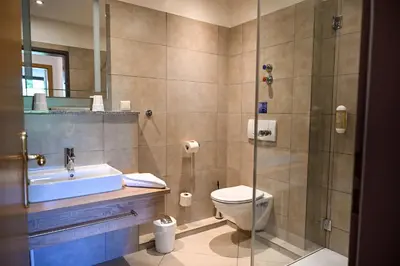Ein Badezimmer in der Unterkunft Weingut Sandwiese Winzerhotel