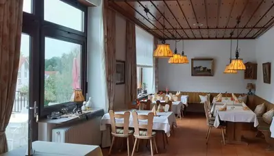 Ein Sitzbereich in der Unterkunft Hotel & Restaurant Krone
