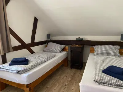 Ein Bett oder Betten in einem Zimmer der Unterkunft Ferienwohnung Obergasse