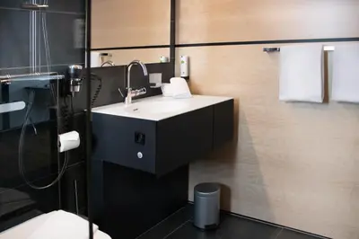 Ein Badezimmer in der Unterkunft KL Hotel by WMM Hotels