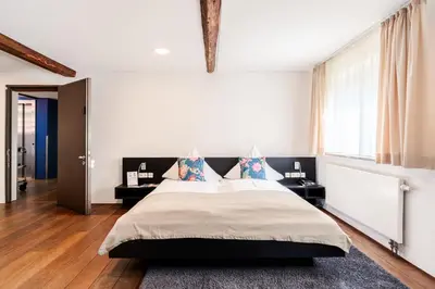 Ein Bett oder Betten in einem Zimmer der Unterkunft Buhlsche Mühle