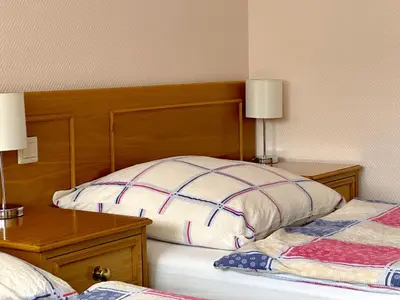 Ein Bett oder Betten in einem Zimmer der Unterkunft Hotel DenRiKo