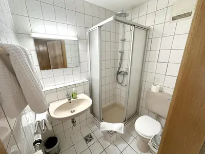 Ein Badezimmer in der Unterkunft Hotel DenRiKo