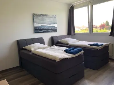 Ein Bett oder Betten in einem Zimmer der Unterkunft Pension Gästehaus Kautz
