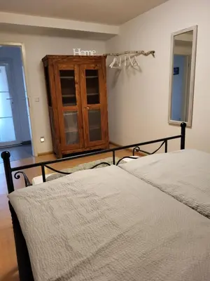 Ein Bett oder Betten in einem Zimmer der Unterkunft Ferienwohnung Kraichgaublick